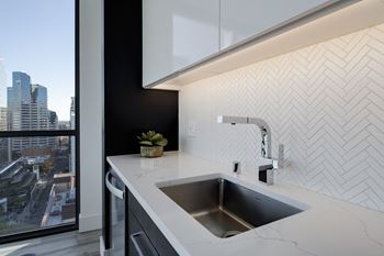 Large under-mount, modern sinks & faucet hardware